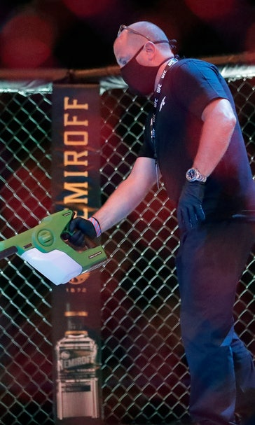 UFC 249 ushers in fan-free, mask-filled era of sports